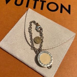 Bulgari Silver and Cream Charm